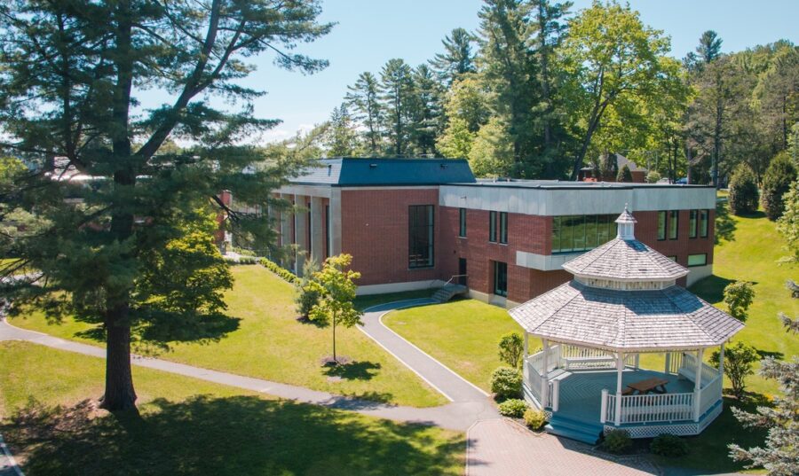 A photo of Bishop's Library and gazebo. It's a bright and sunny day.