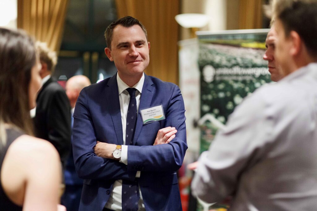 Paul Squires in a suit at a function.