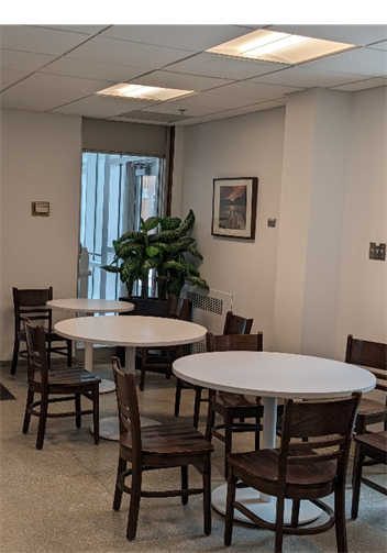 Round tables and wooden chairs in a café.