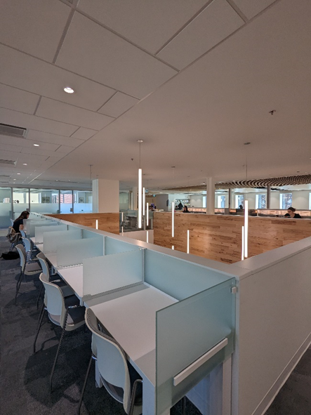 Row of white desks in the library.