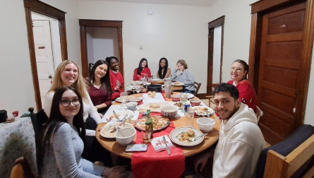 Friends around a table eating diner